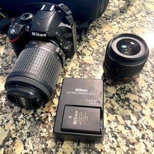 Nikon D3200 Digital Camera with extra lens, strap, bag, battery/charger.